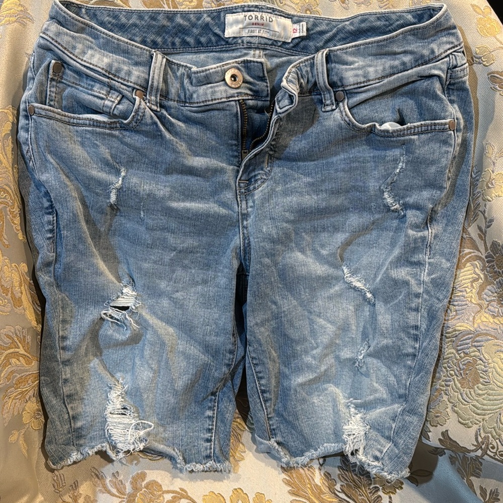 Women’s light blue ripped jean shorts